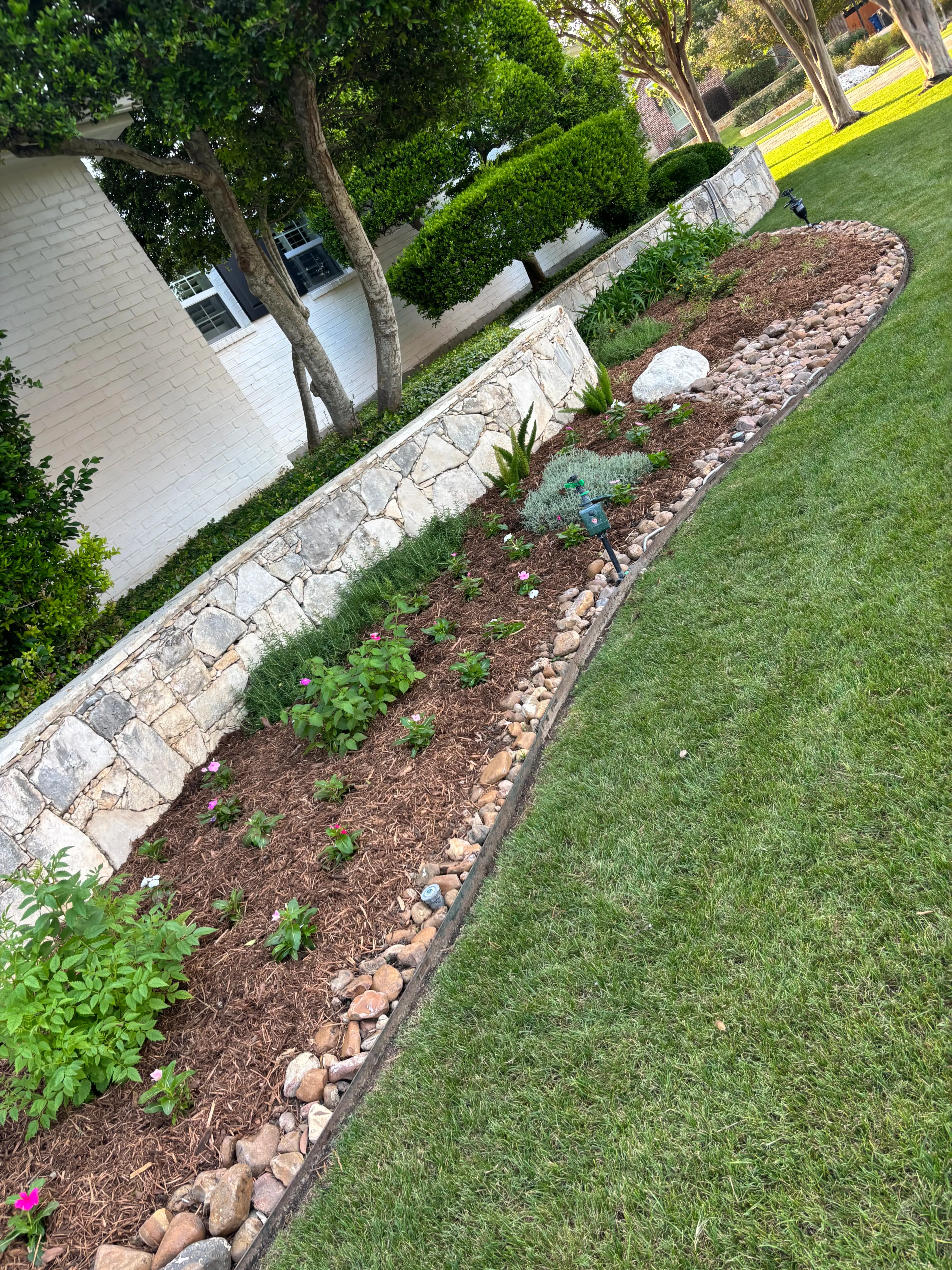 Flower bed and lawn in pristine condition