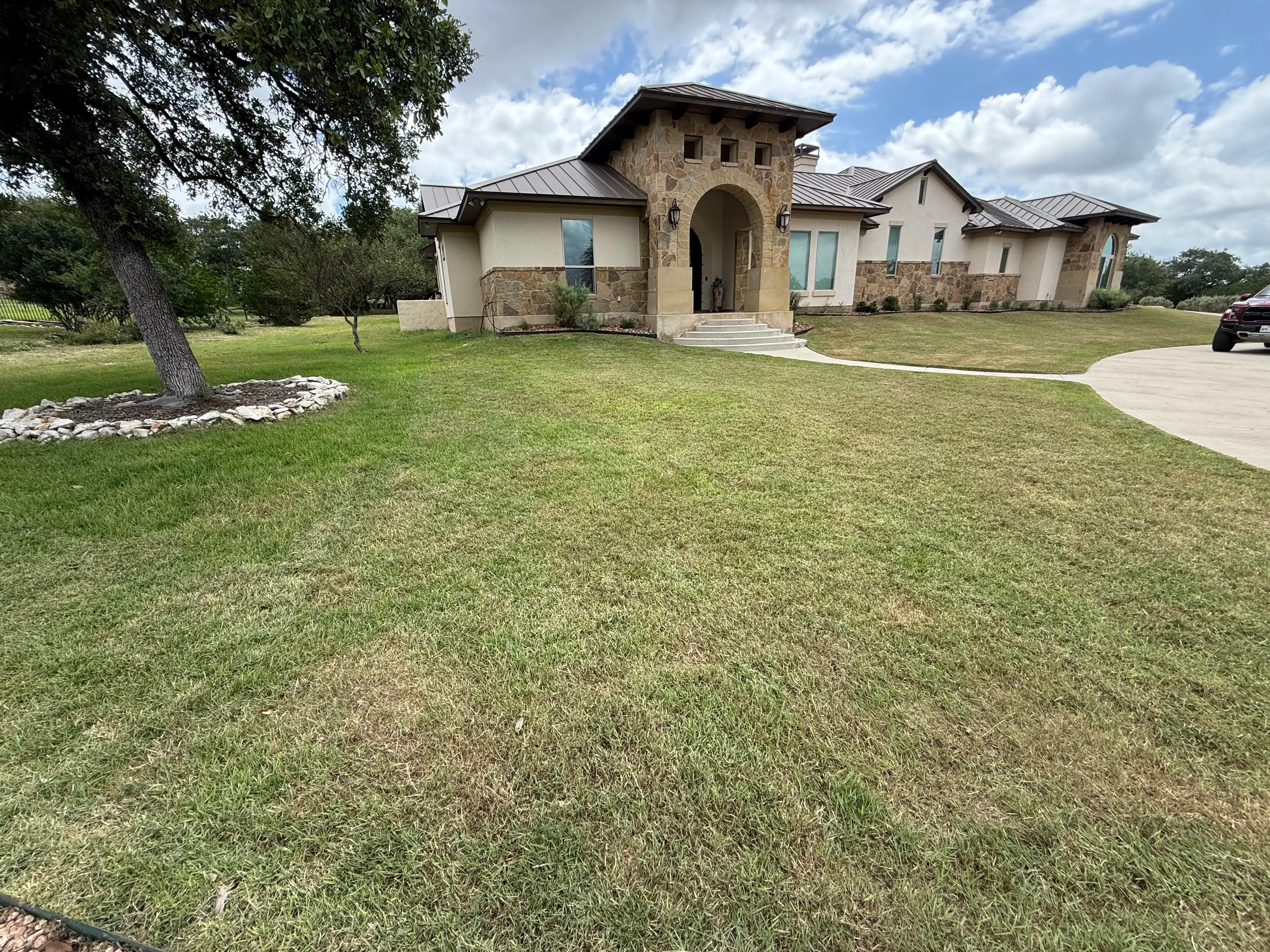 Large front property professionally mowed with care