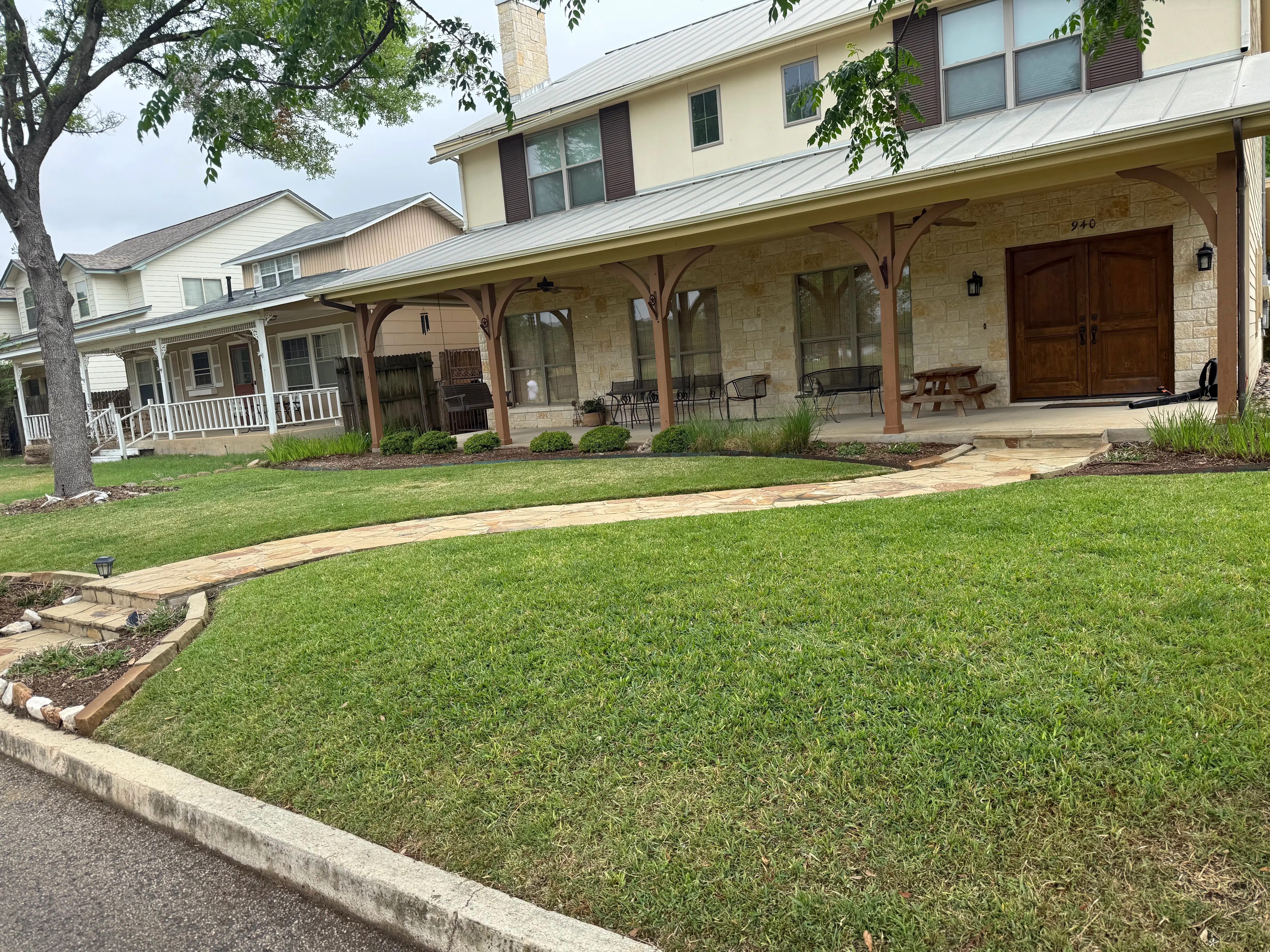 Mowed front lawn that was dethatched.