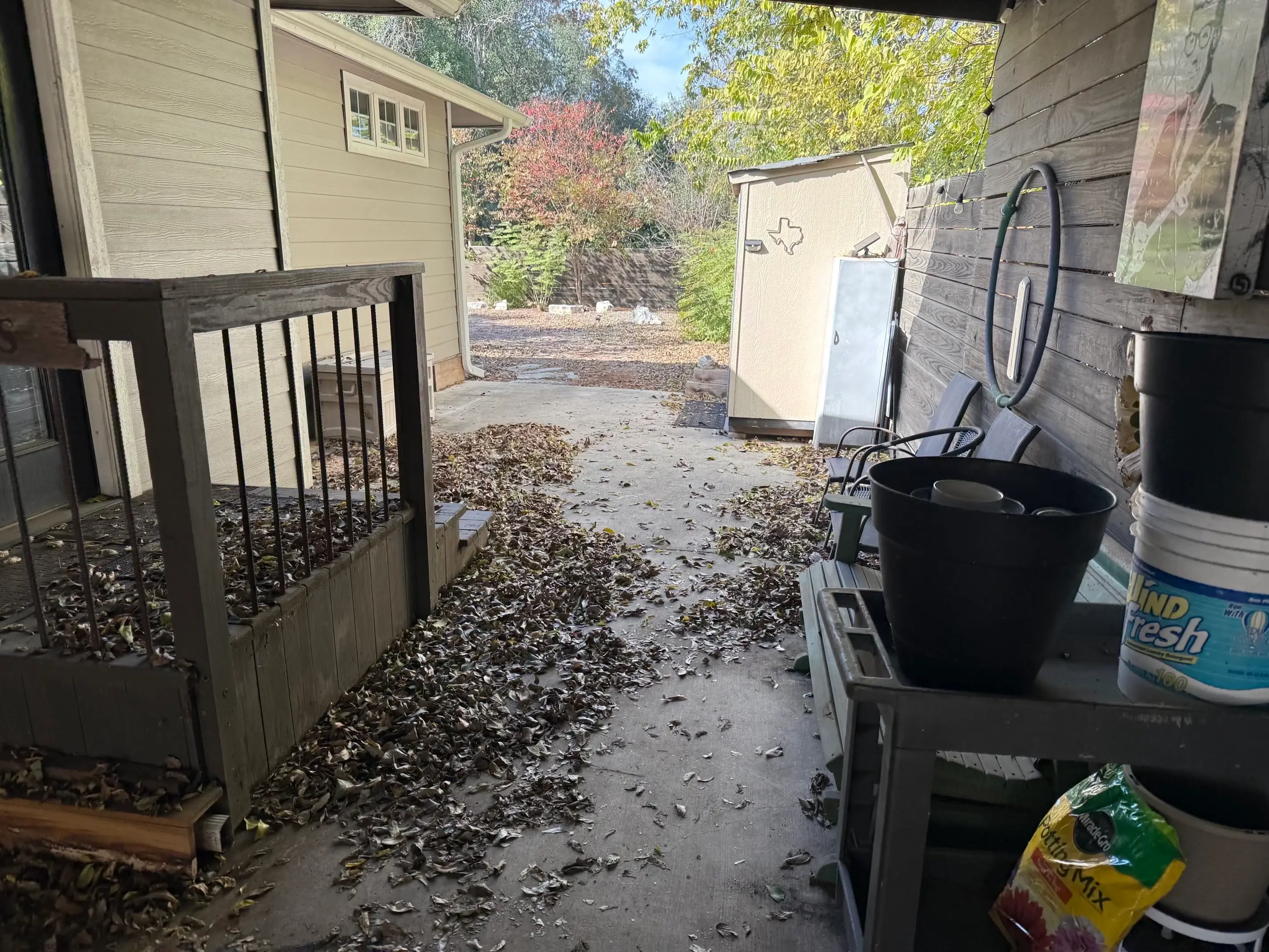 Piles of leaves on a patio